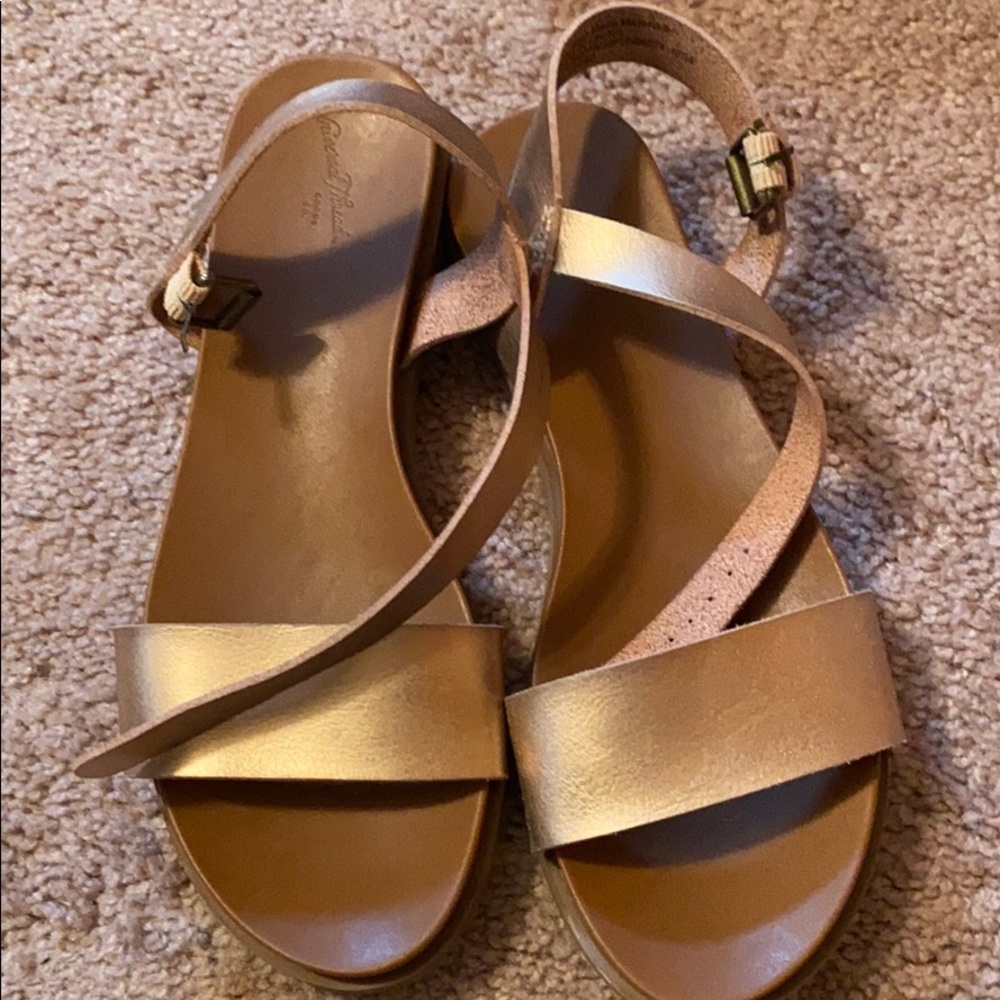 Women hold sandal